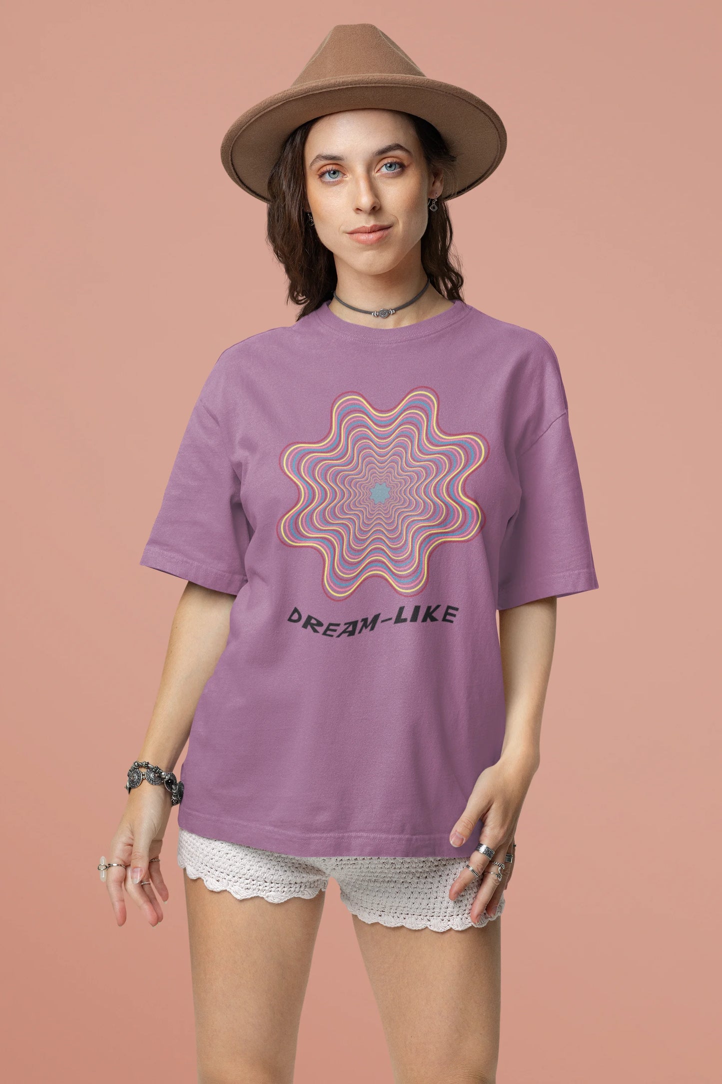 Second front view of a female model wearing an dirty purple oversized t-shirt with a dreamlike spiderweb design made of frequencies, offering a visually captivating and relaxing aesthetic.