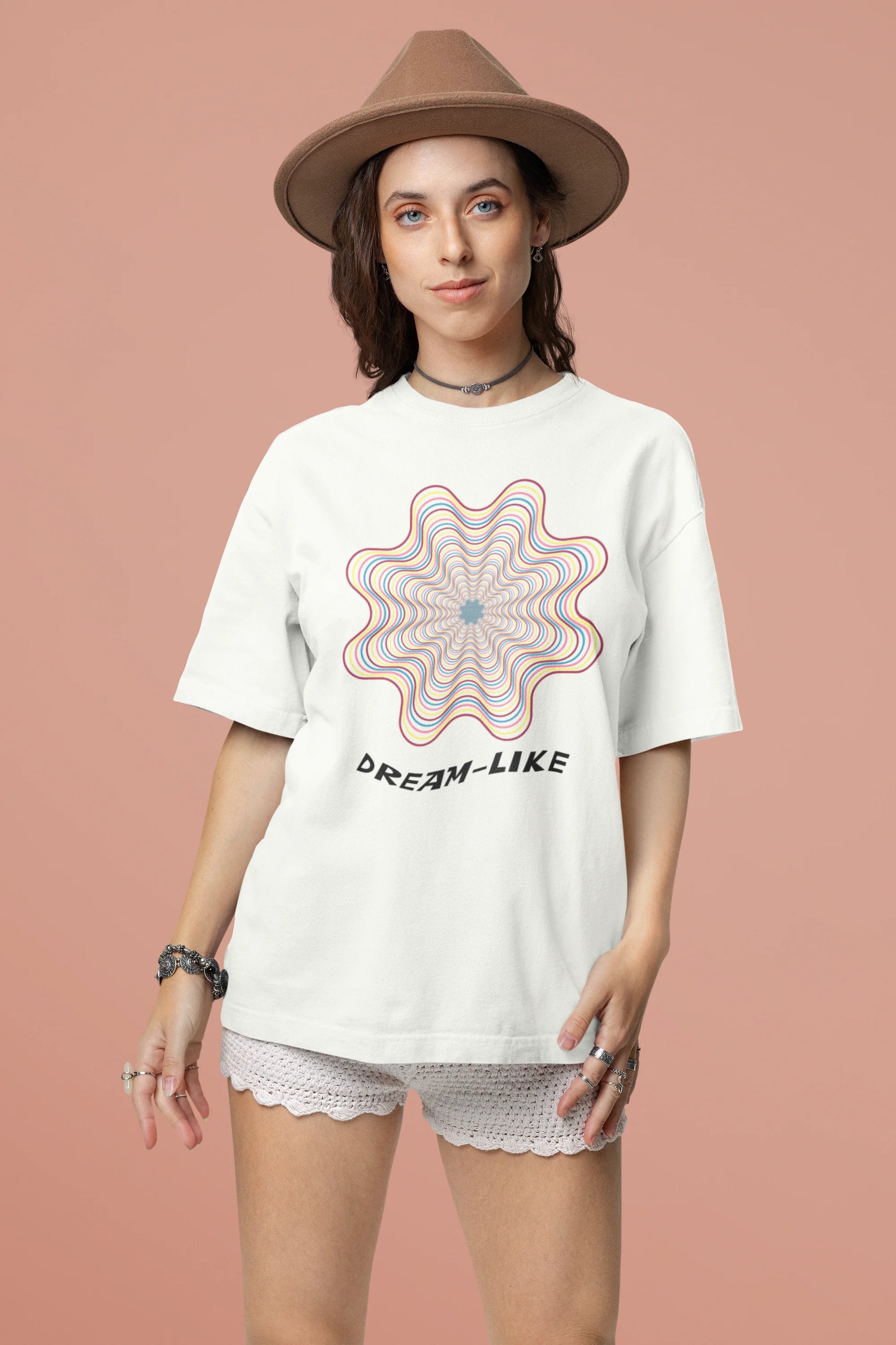 Second front view of a female model wearing an off-white Oversized t-shirt with a dreamlike spiderweb design made of frequencies, offering a visually captivating and relaxing aesthetic.