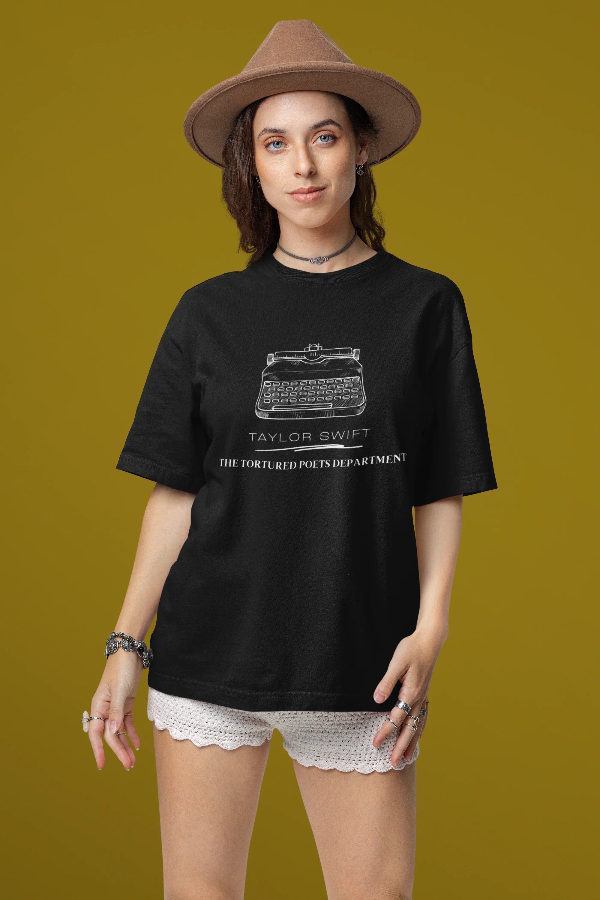 Third image of woman wearing TTPD-inspired black oversize t-shirt TTPD collection tees, embodying Taylor Swift's unique Swiftie aesthetic.