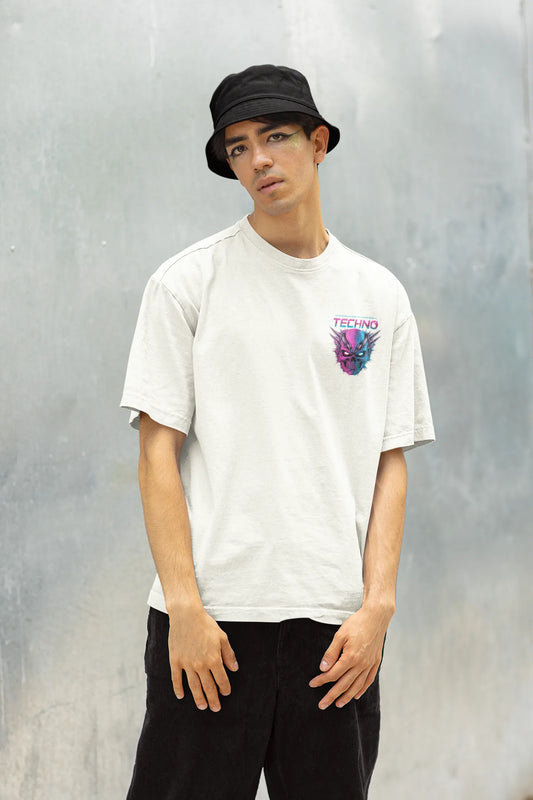 Right side view of a male model wearing an off-white oversized t-shirt with a stylized Techno Skull design, perfect for rave and party vibes.