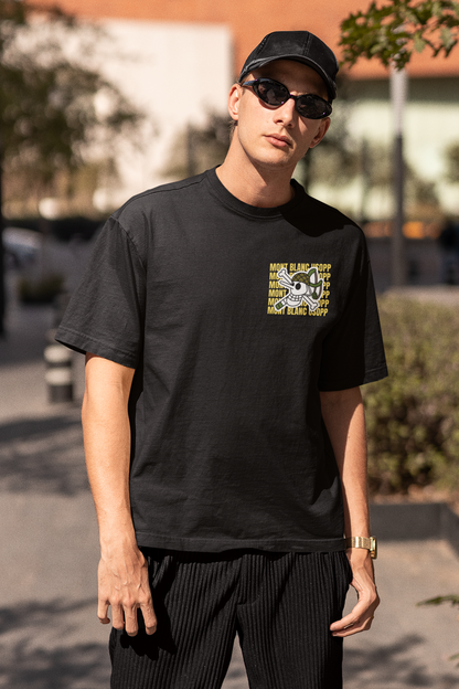 3rd front view of a male model wearing a black oversized t-shirt featuring Usopp from the One Piece anime.