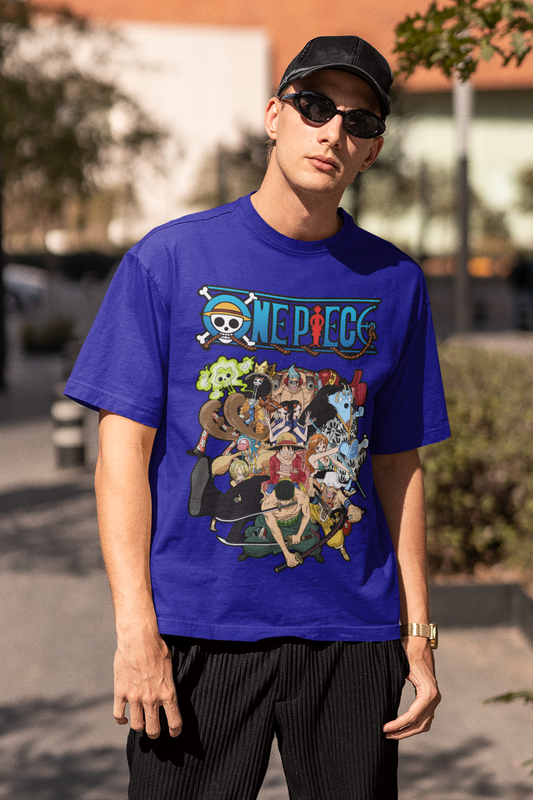 3rd front view of a male model wearing a royal blue oversized t-shirt featuring the entire Straw Hat Crew from the One Piece anime.