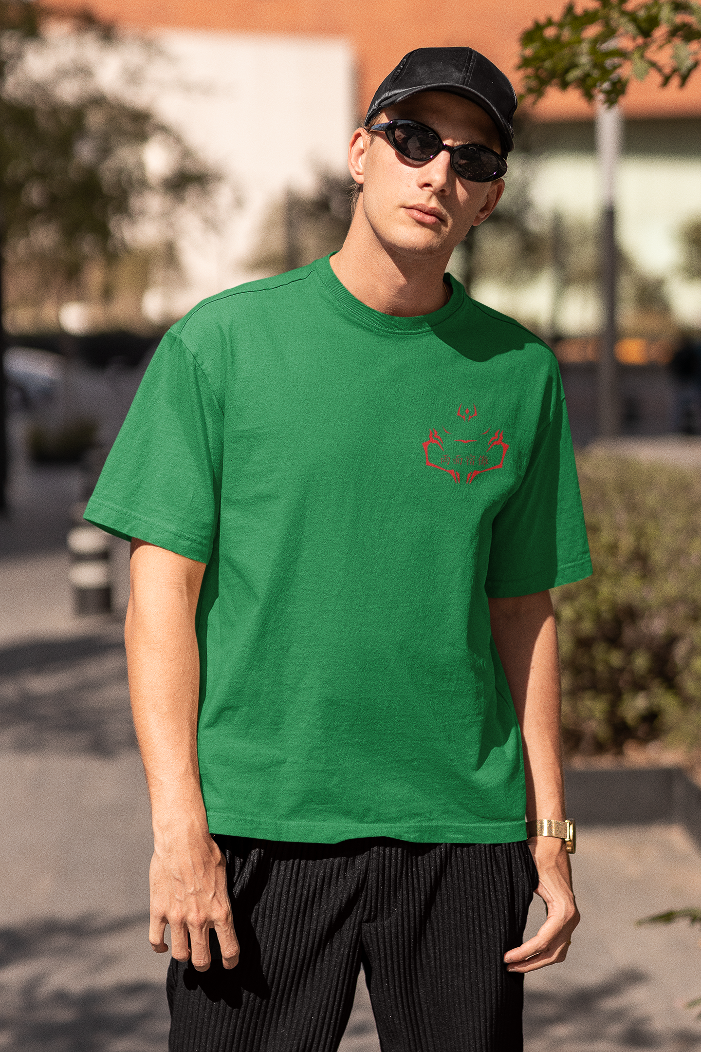 3rd front view of a male model wearing a forest green oversized t-shirt featuring Ryomen Sukuna with the text "I'm Sakuna."
