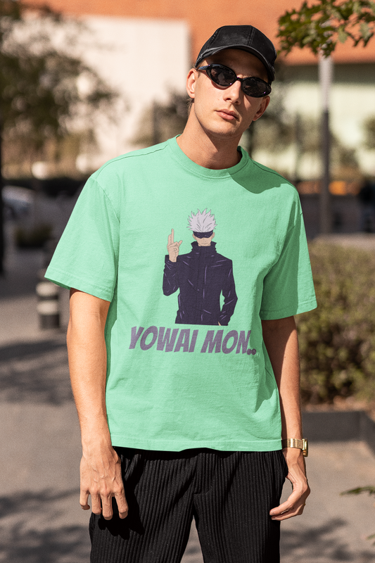 2nd front view of a male model wearing a mint green oversized t-shirt featuring Gojo Satoru with his fingers crossed and the text "Yowai Mon."