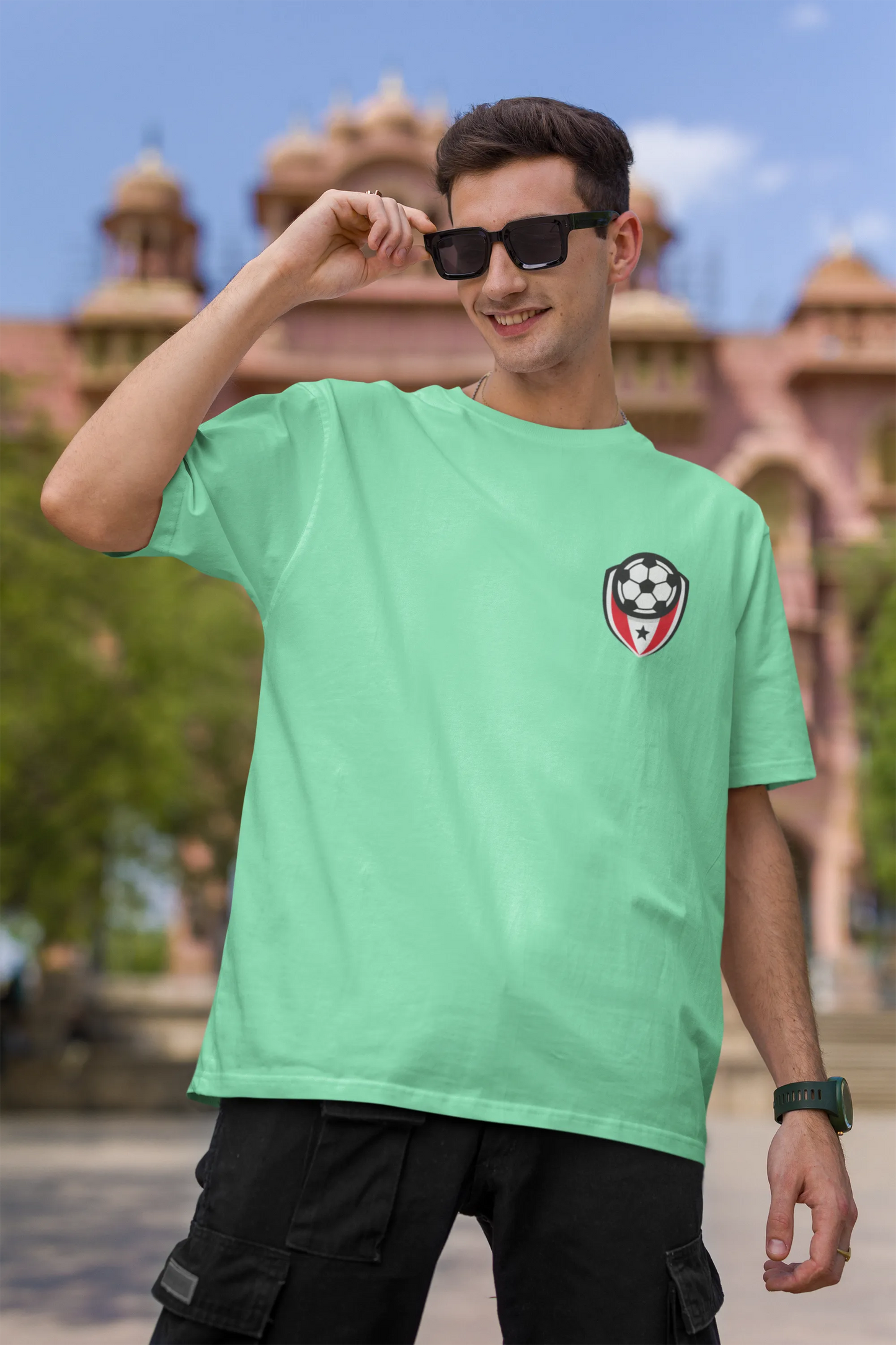 Football Badge | Minimalist | Dropped Sleeve Unisex Tee