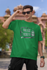 First image of man wearing green coloured Oversized Taylor Swift T-Shirt featuring TTPD inspired design.