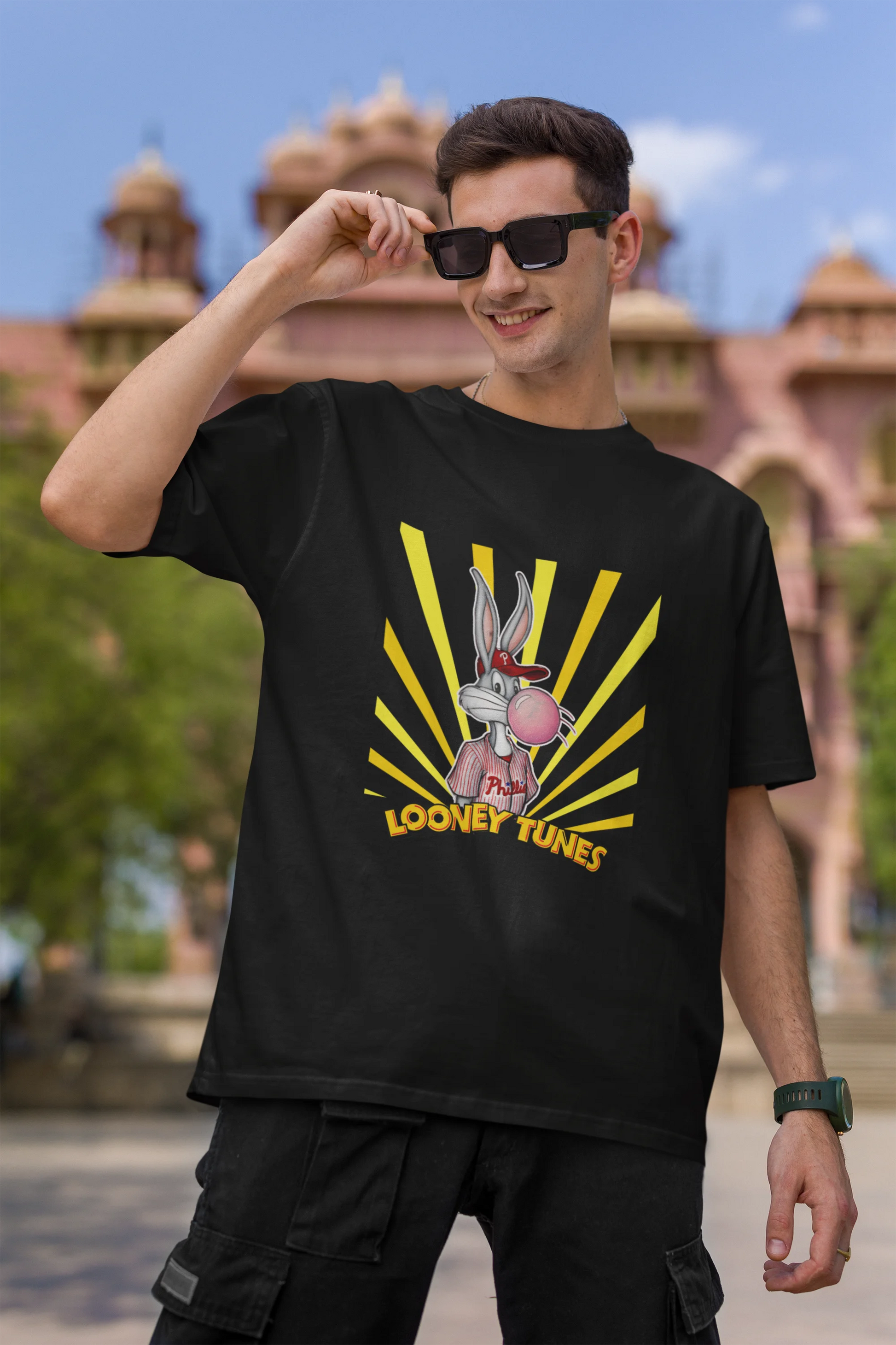 First image of male Model showcasing black Bugs Bunny oversize t-shirt from Looney Tunes, featuring a bold Bugs Bunny design