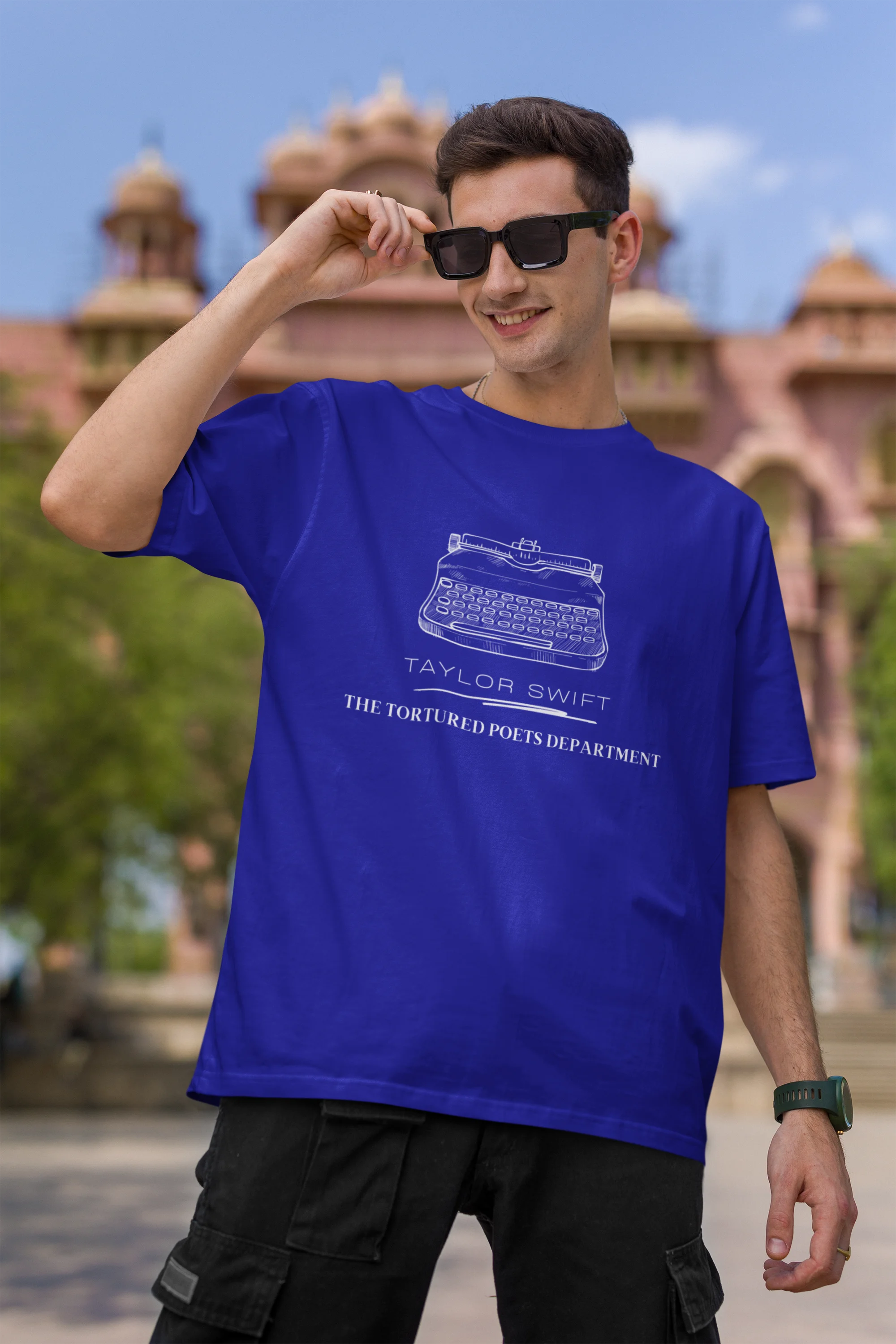 Second image of man wearing TTPD-inspired blue oversize t-shirt TTPD collection tees, embodying Taylor Swift's unique Swiftie aesthetic.