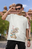 First image of male model wearing off-white oversized tee with a Disney's Chip and Dale design, featuring the adorable duo in a playful scene.