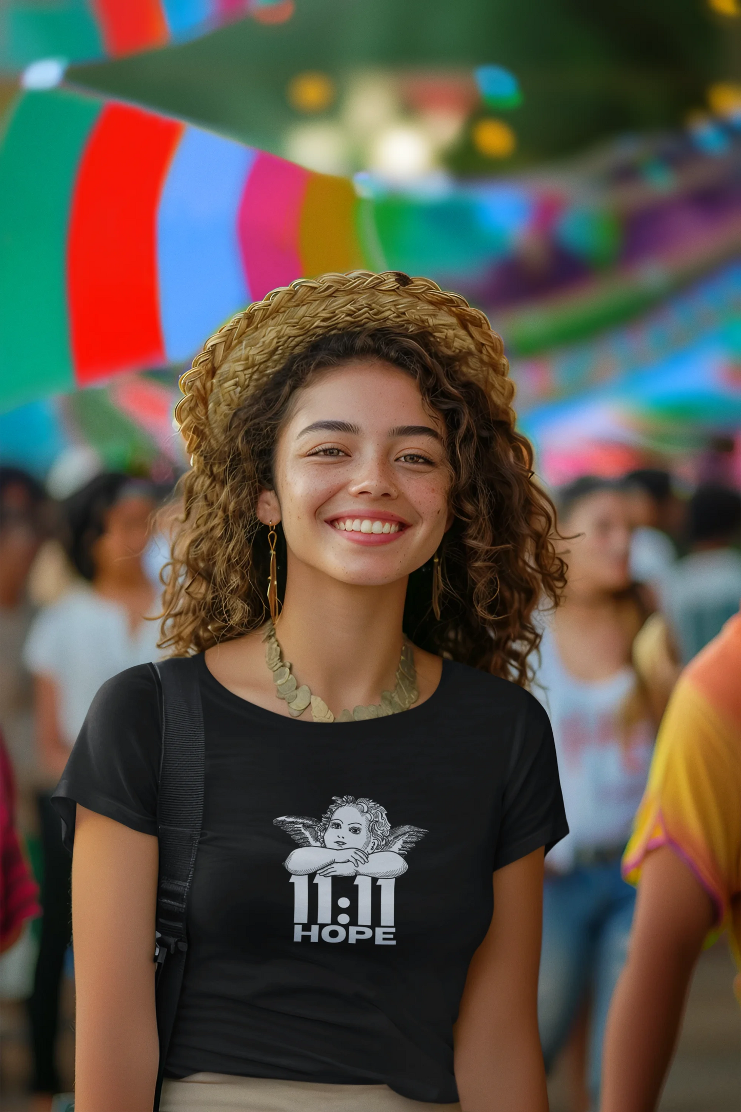 Second front view of a female model wearing a black crop top with a baby angel design and "11:11 Hope" text, radiating positivity and hope.
