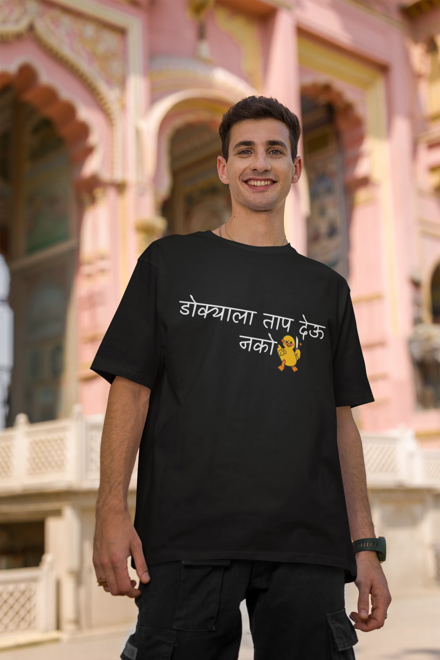 Second front view of a male model wearing a black oversized t-shirt featuring a design inspired by Marathi culture. Perfect for anyone who loves Maharashtra and its vibrant traditions.