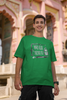 Second image of man wearing green coloured Oversized Taylor Swift T-Shirt featuring TTPD inspired design.