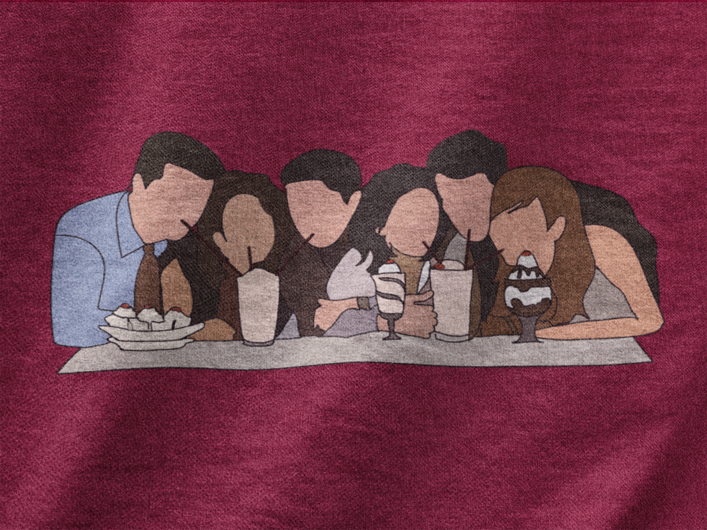 Close up view of a maroon casual tee with Friends TV show inspired design featuring the central perk crew.