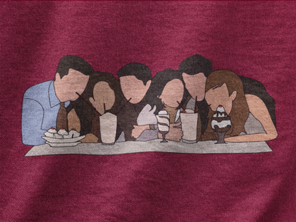 Close up view of a maroon casual tee with Friends TV show inspired design featuring the central perk crew.