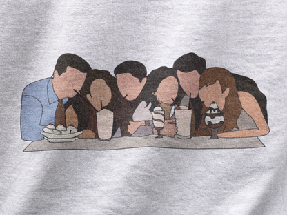 Close up view of a white casual tee with Friends TV show inspired design featuring the central perk crew.